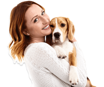 Woman holding a dog for the Hale Pet Door testimonials section