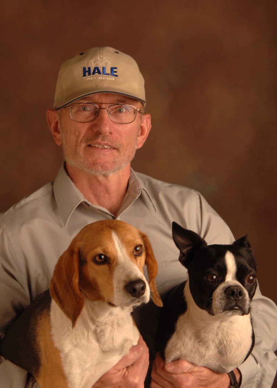 Bill Hale, founder of Hale Pet Door, with his dogs